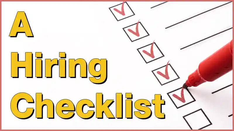 A client reviewing a checklist before signing a contract with a corporate video editing service Durham.